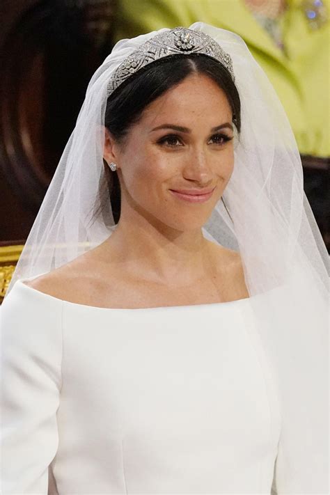 Meghan Markle wears Givenchy wedding dress to marry Prince Harry.